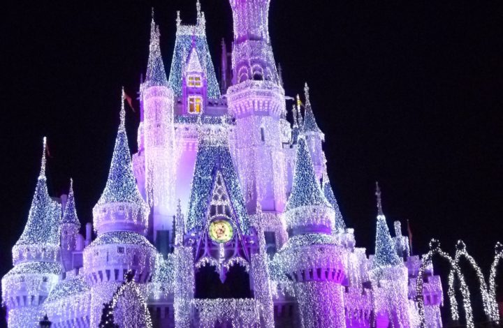 Cinderella's Castle lit up at night.